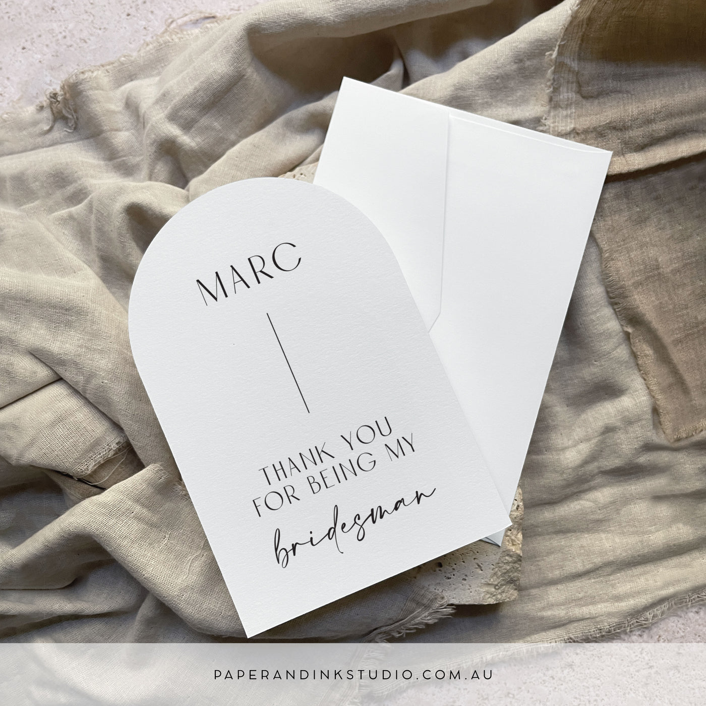 A flat white arch shaped card that can be personalised with the receiver's name, to thank them for being a part of of the couple's wedding party. This one says thank you for being my bridesman.
