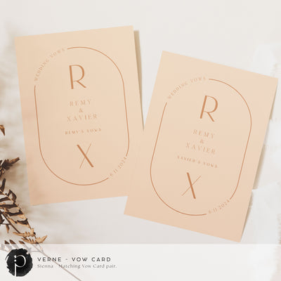 A pair of vow cards to write your wedding vows on in a modern midcentury wedding theme with light terracotta text on a soft peach background