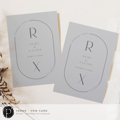 A pair of vow cards to write your wedding vows on in a modern midcentury wedding theme with dark grey writing on a light grey background