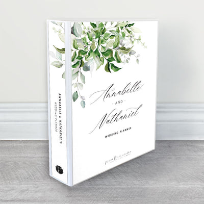 A wedding planner, guide and organiser in a botanical wedding theme or garden wedding theme with grass green, emerald green and sage green leaves and black calligraphy