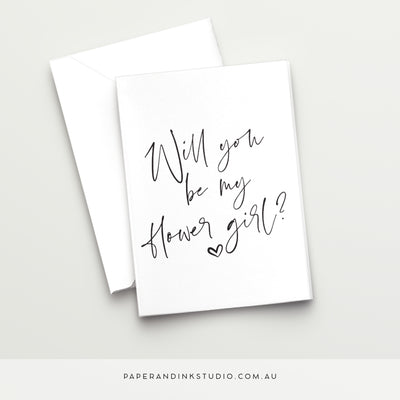 A white folded wedding or best woman card in a design called Thorne with black writing that says will you be my flower girl, asking your niece, child, godchild or friend's child to be your flower girl at your wedding.