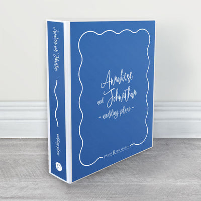 A wedding planner, guide and organiser in a retro and modern design in indigo or cobalt blue with white writing